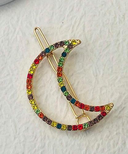 Multi-colored crescent-shaped hair accessory