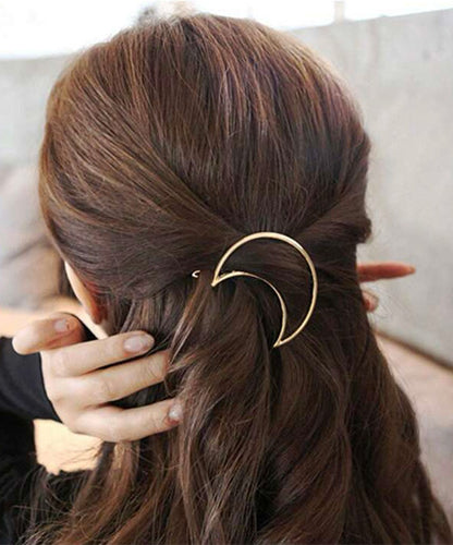 Hair Accessory gold in the shape of a crescent moon