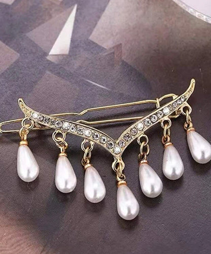 Hair Accessory Gold containing dangling beads