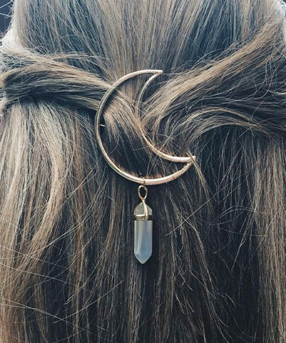 Hair Accessory Gold  in the shape of a crescent